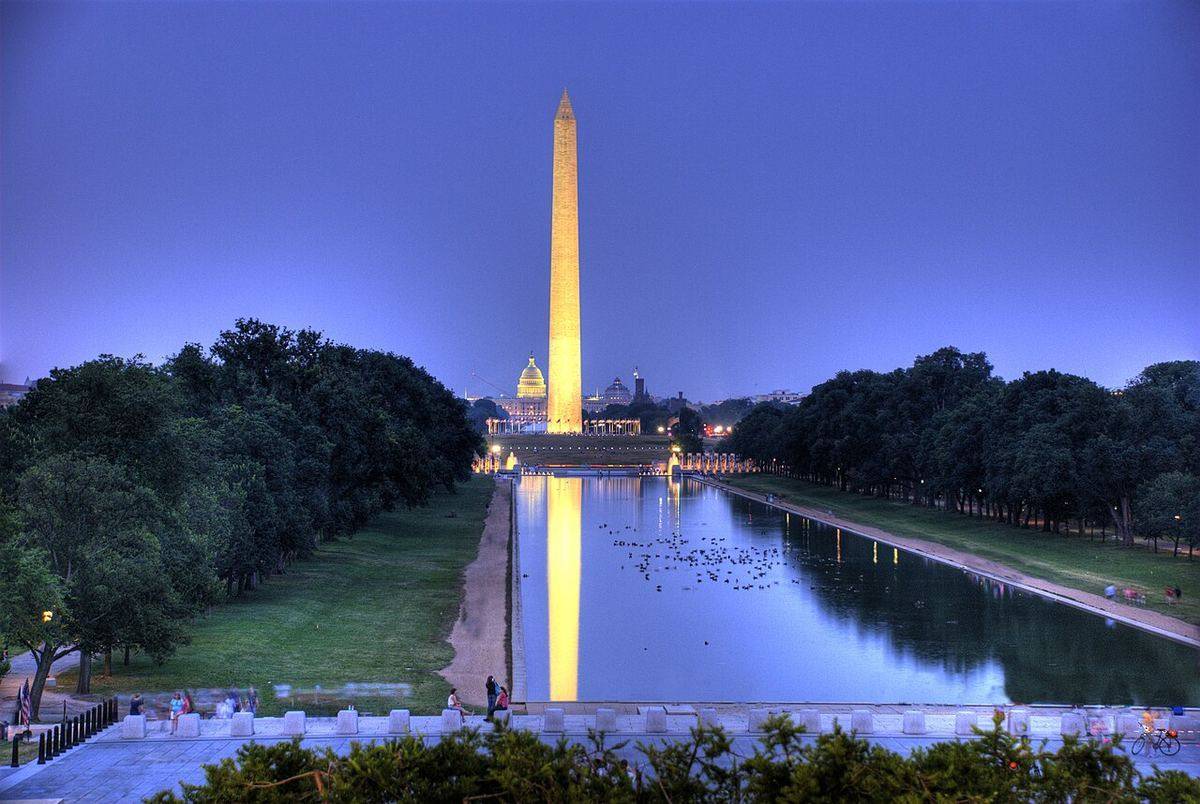 Washington Monument illuminated at night in Washington DC, best views travel guide